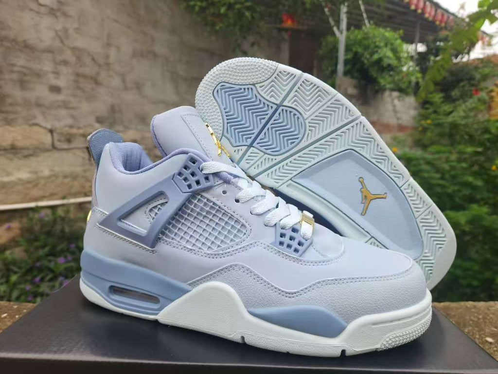 Air Jordan 4 Retro 'University Blue' – Carolina Blue Suede Sneaker
