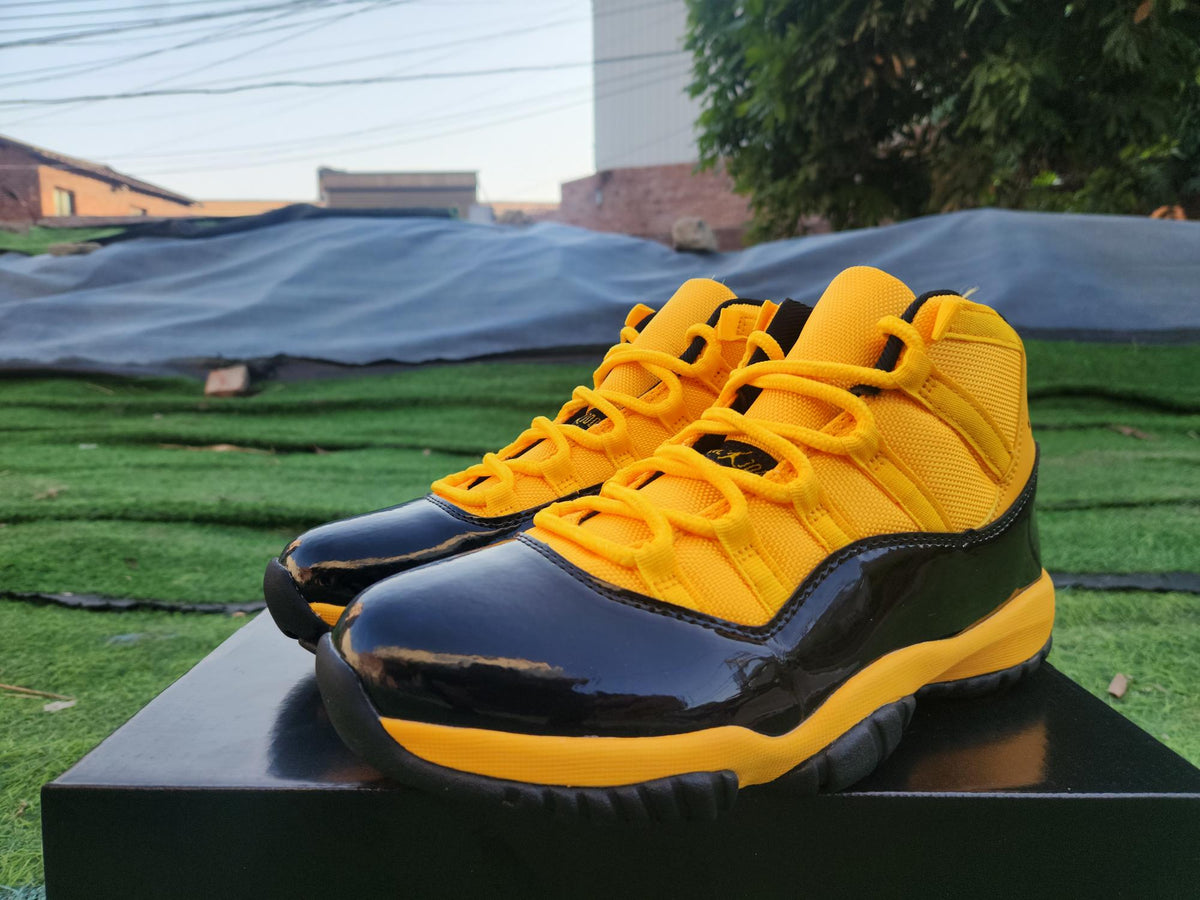 Air Jordan 11 Orange/Yellow/Black Sneakers