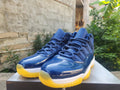 Air Jordan 11 Dark Blue & Yellow Sneakers