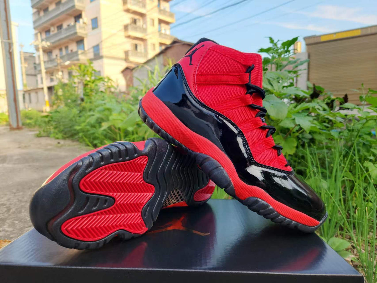 Air Jordan 11 Red & Black Sneakers