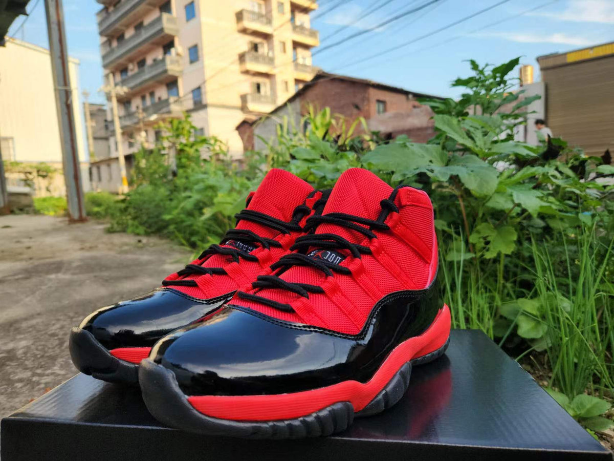 Air Jordan 11 Red & Black Sneakers