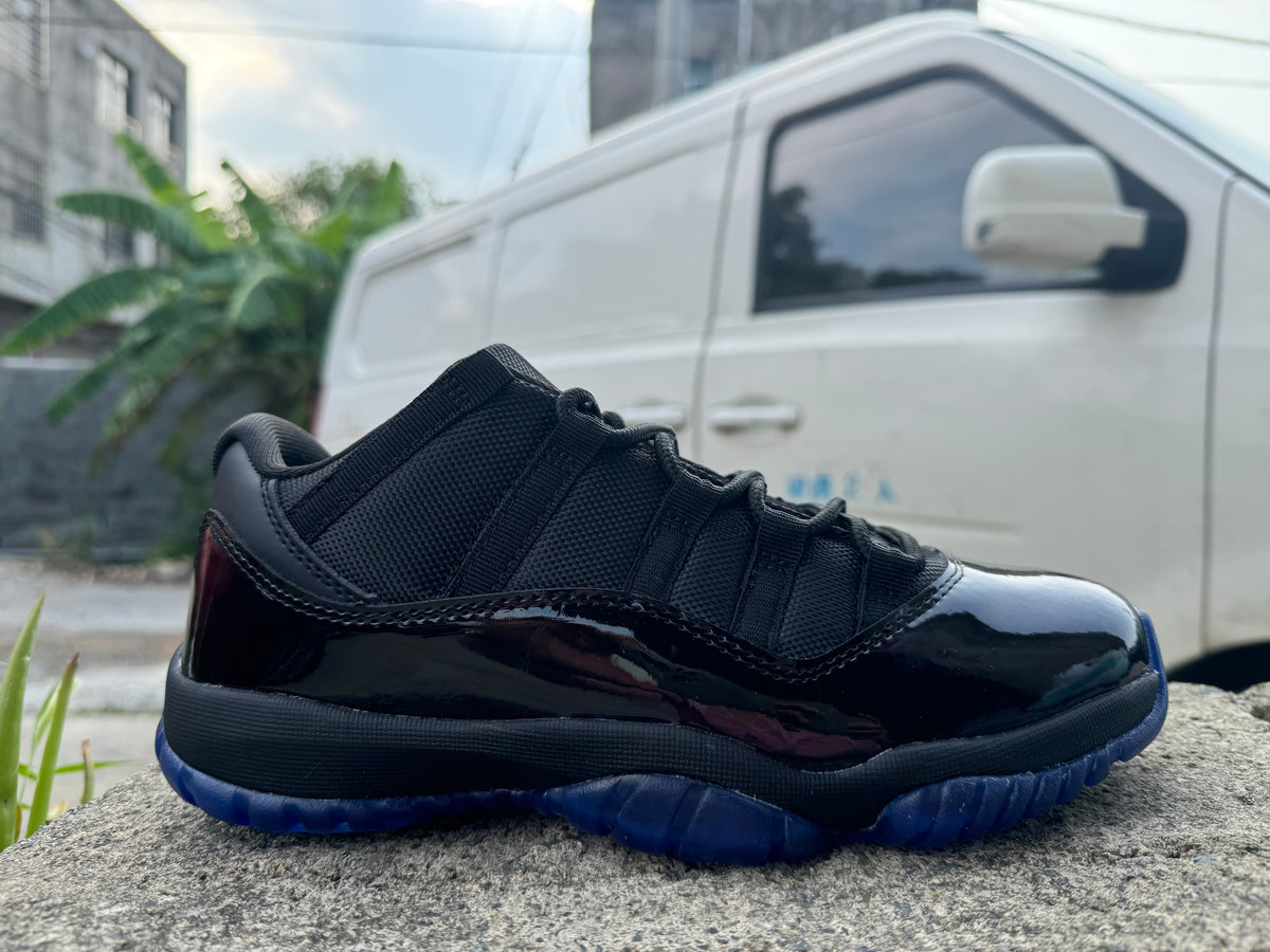 Air Jordan 11 Black & Gamma Blue Sneakers