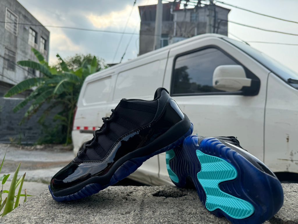 Air Jordan 11 Black & Gamma Blue Sneakers