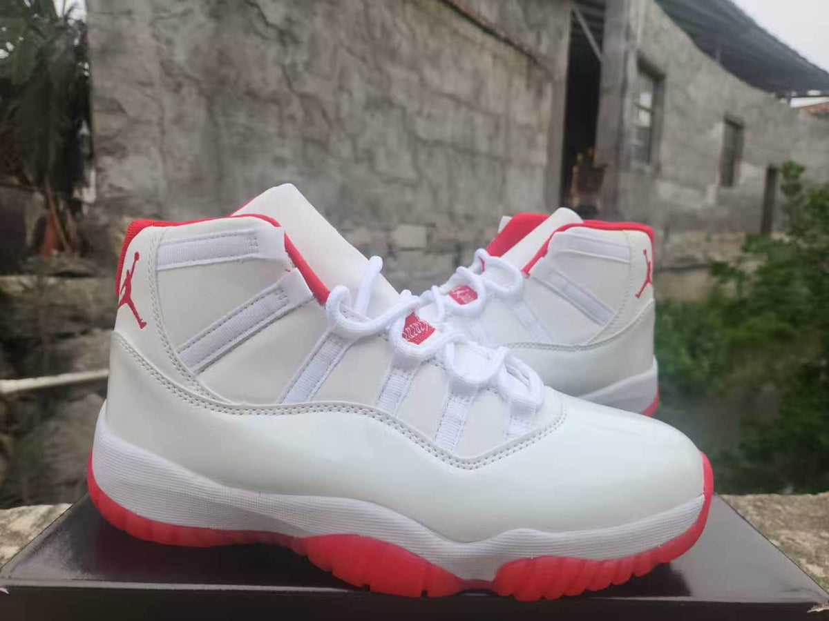 Air Jordan 11 White & Red Sneakers