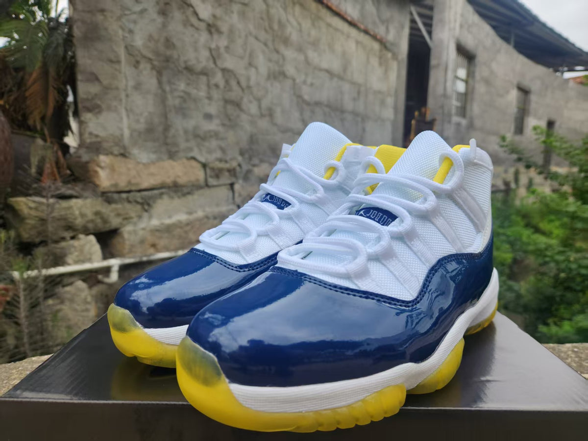 Air Jordan 11 White, Blue & Yellow Sneakers